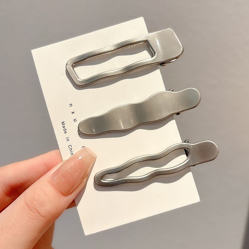 Tippet Line - Pinza para el pelo plateada mate